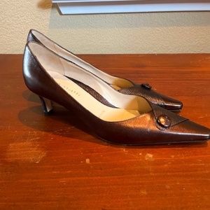 Brand new in box Almafi 2" pumps. Bronze in color in a size 6